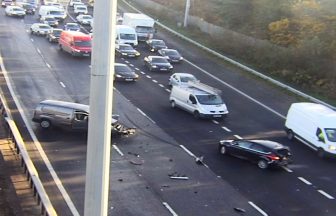 M8 traffic chaos and lanes blocked after car and van crash