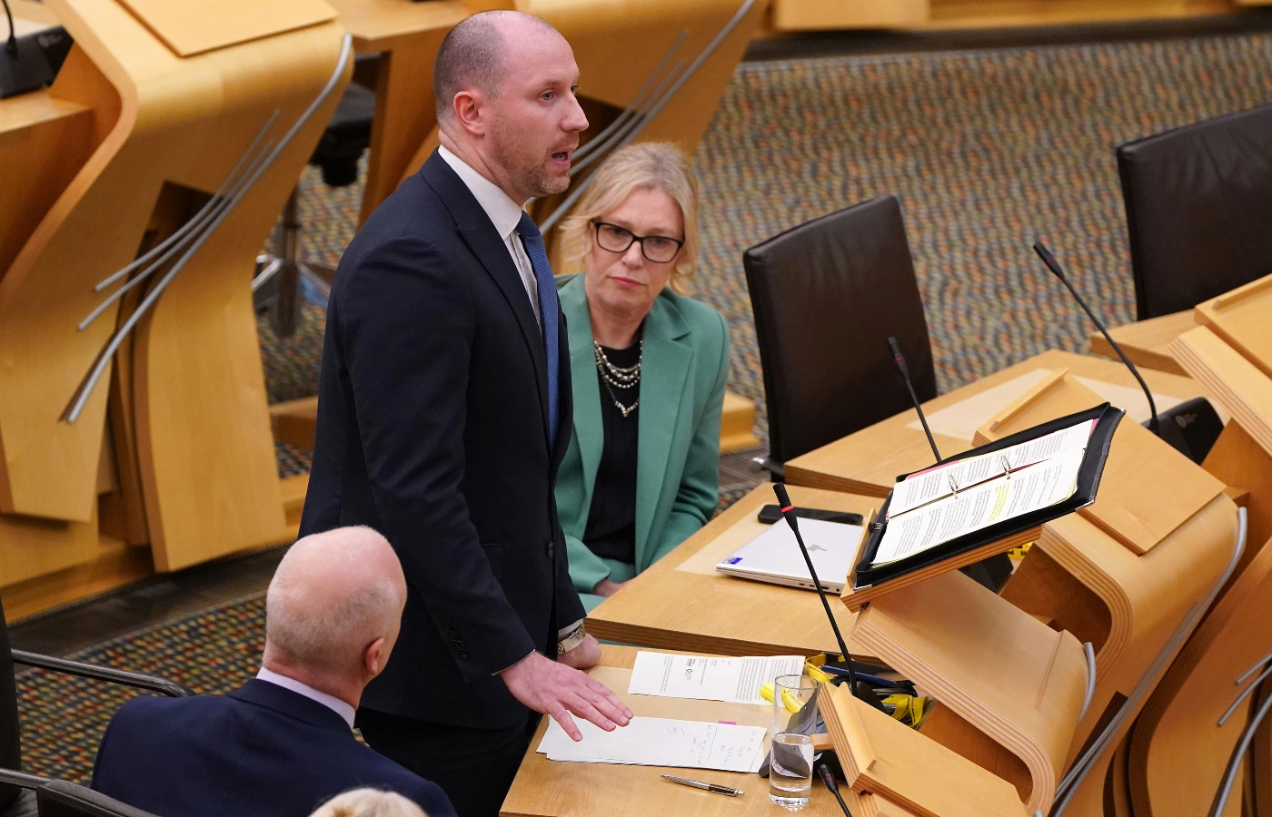 Wellbeing Economy Secretary Neil Gray updated MSPs on the work on the ferries – which are both delayed and overbudget (Andrew Milligan/PA)