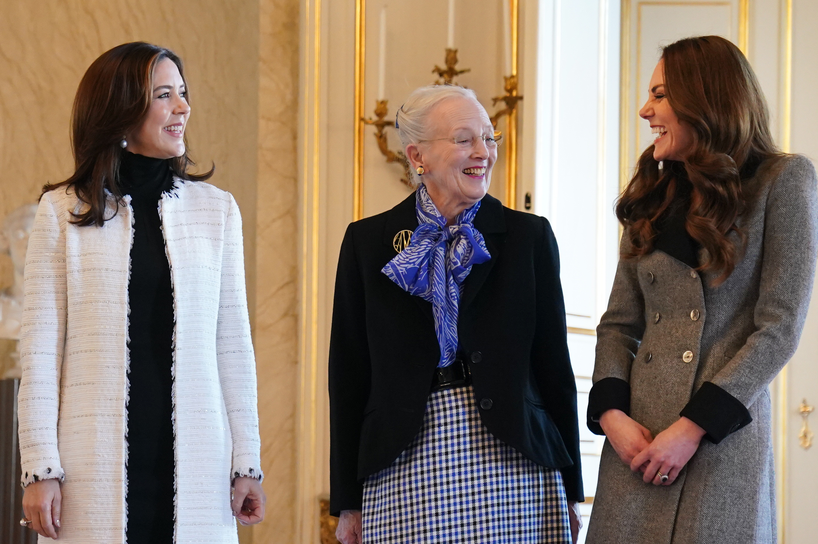 The Duchess of Cambridge is welcomed by Queen Margrethe II (centre) and Crown Princess Mary of Denmark during an audience at Christian IX's Palace, Copenhagen, Denmark, on day two of a two-day working visit with The Royal Foundation Centre for Early Childhood. Picture date: Wednesday February 23, 2022.