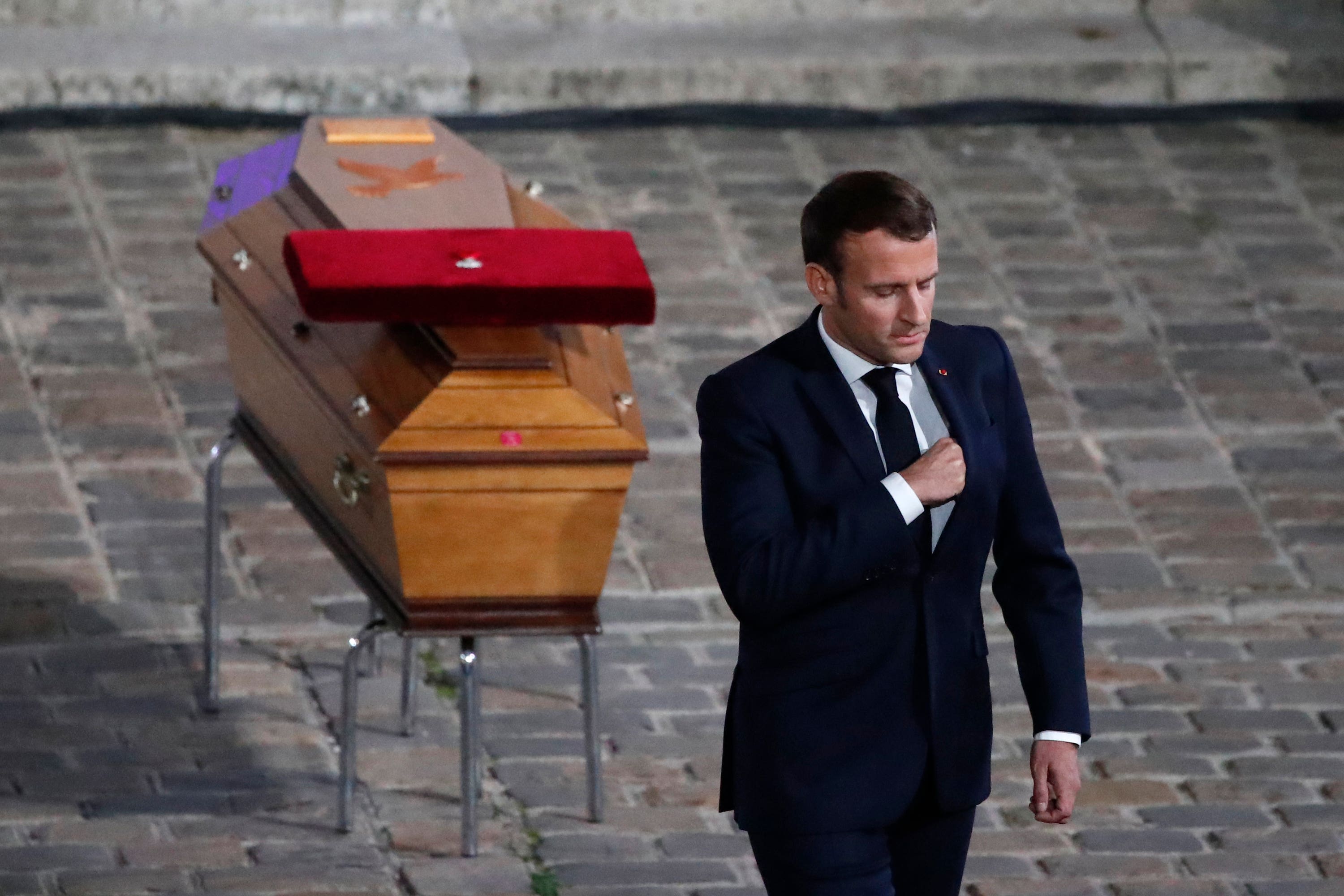 French President Emmanuel Macron paid his respects to teacher Samuel Paty (Francois Mori, Pool/AP) 