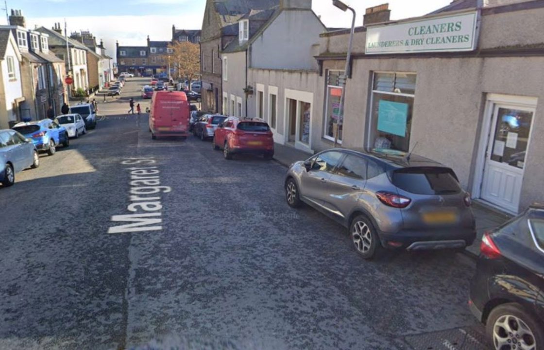 Man left in hospital after being struck by car while crossing road