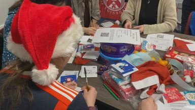 Students deliver Christmas cards to care home residents