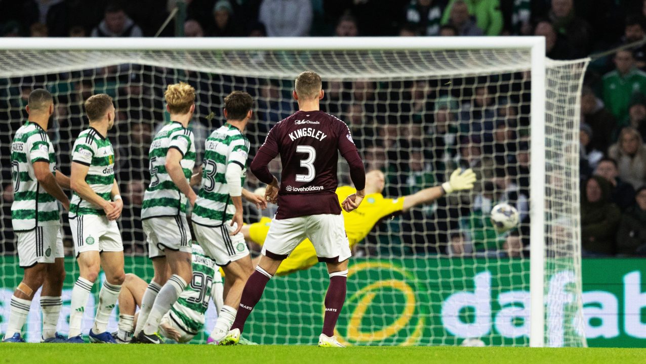 Jeers ring round Parkhead as Hearts win at Celtic