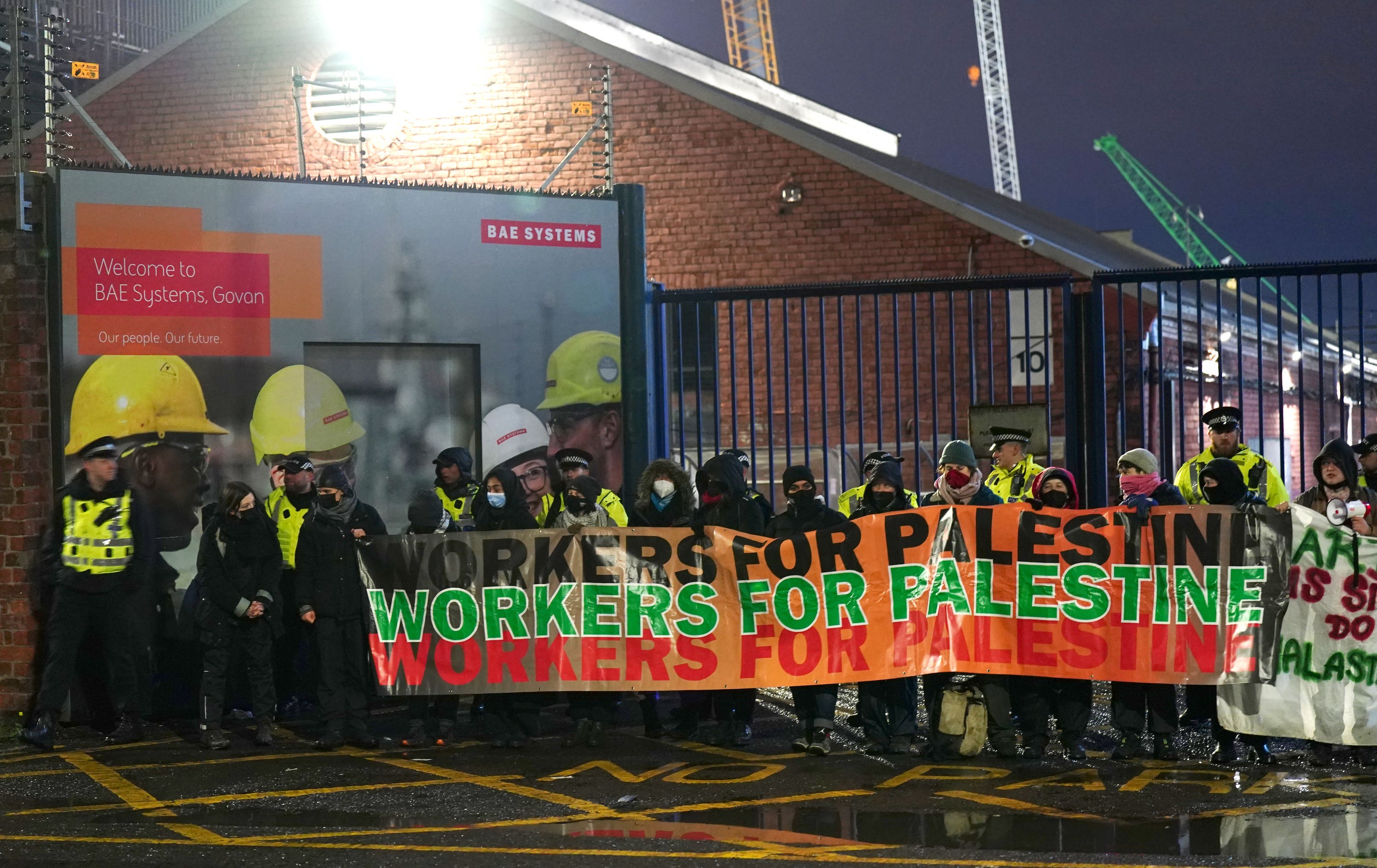 Protesters form a blockade outside BAE Systems in the Govan area.