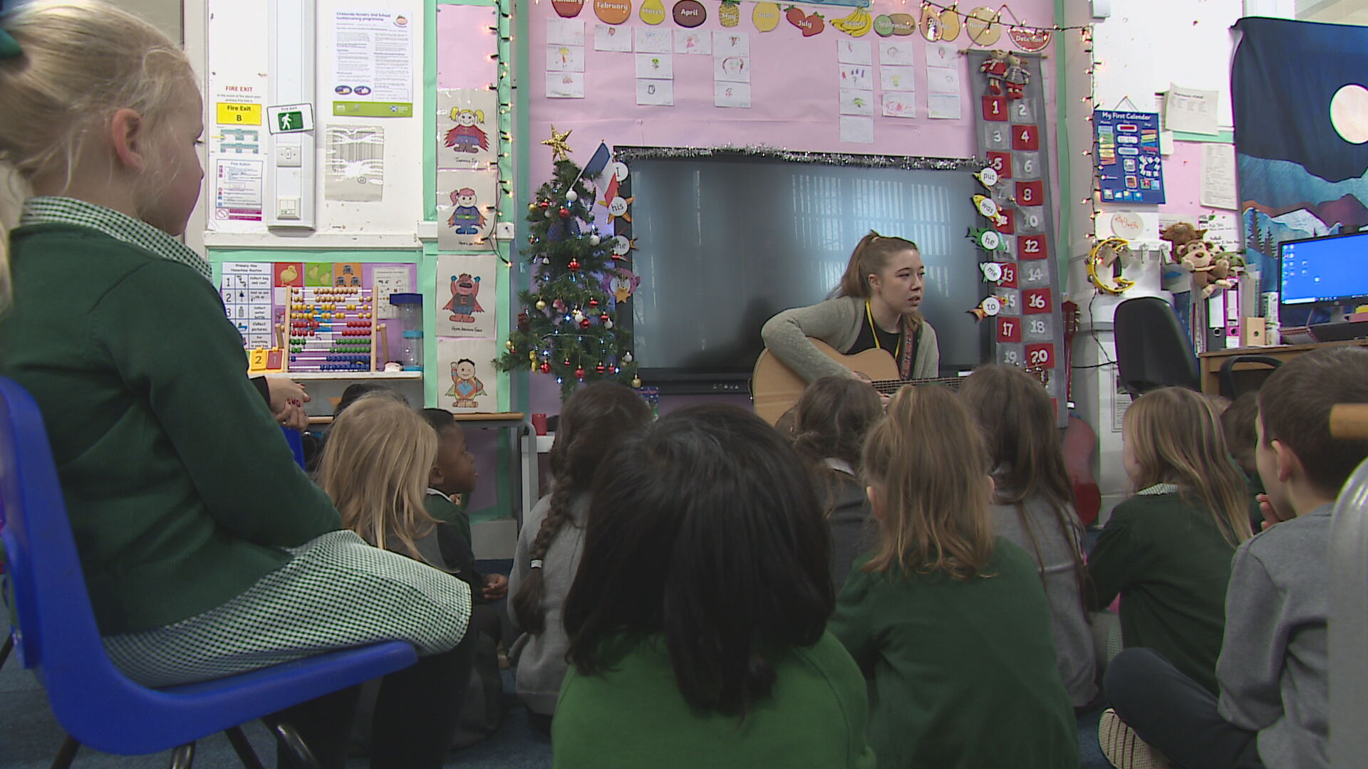 Alyssa teaching the pupils a song. 