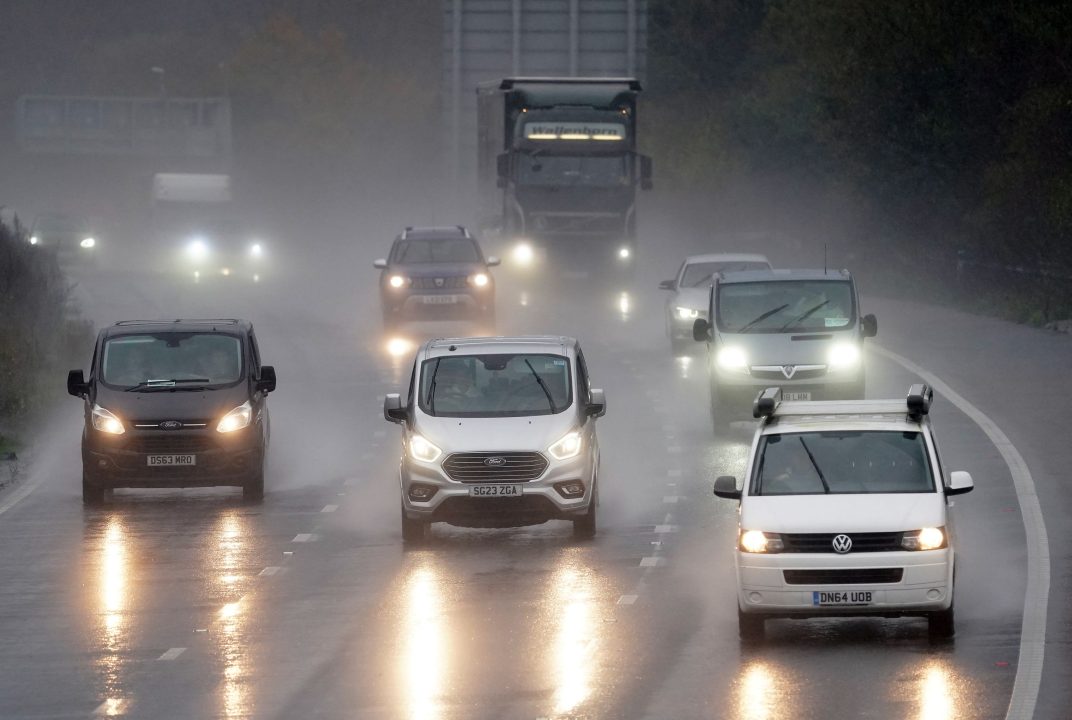 How can I stay safe when driving in heavy rain amid Met Office flood warnings across Scotland