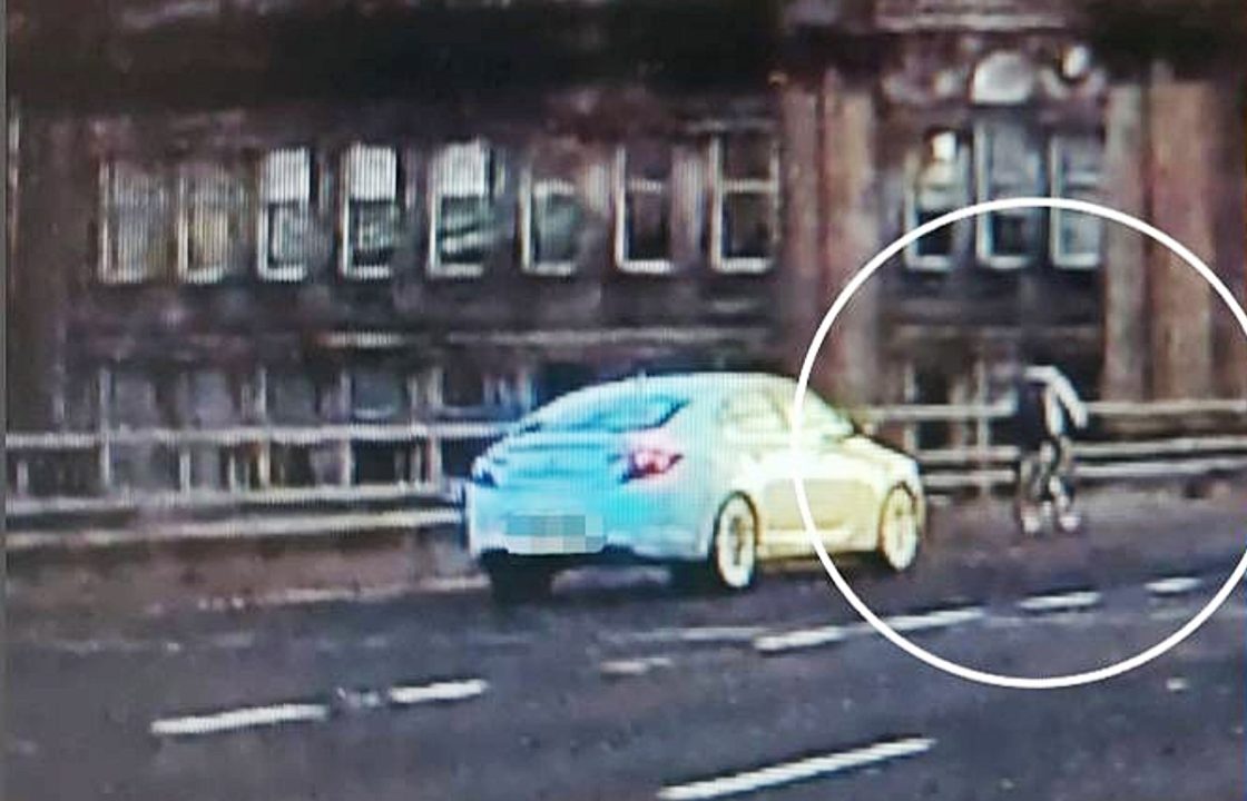 Cyclist caught riding on M8 motorway over Kingston Bridge in Glasgow