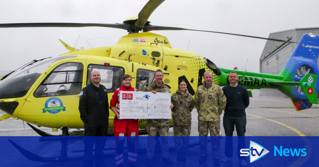 RAF officer presents fundraising cheque to Scottish Air Ambulance ...