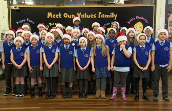 ‘Santa Claus is coming to town’: Young carollers at St Anne’s Primary in Glasgow share Christmas spirit