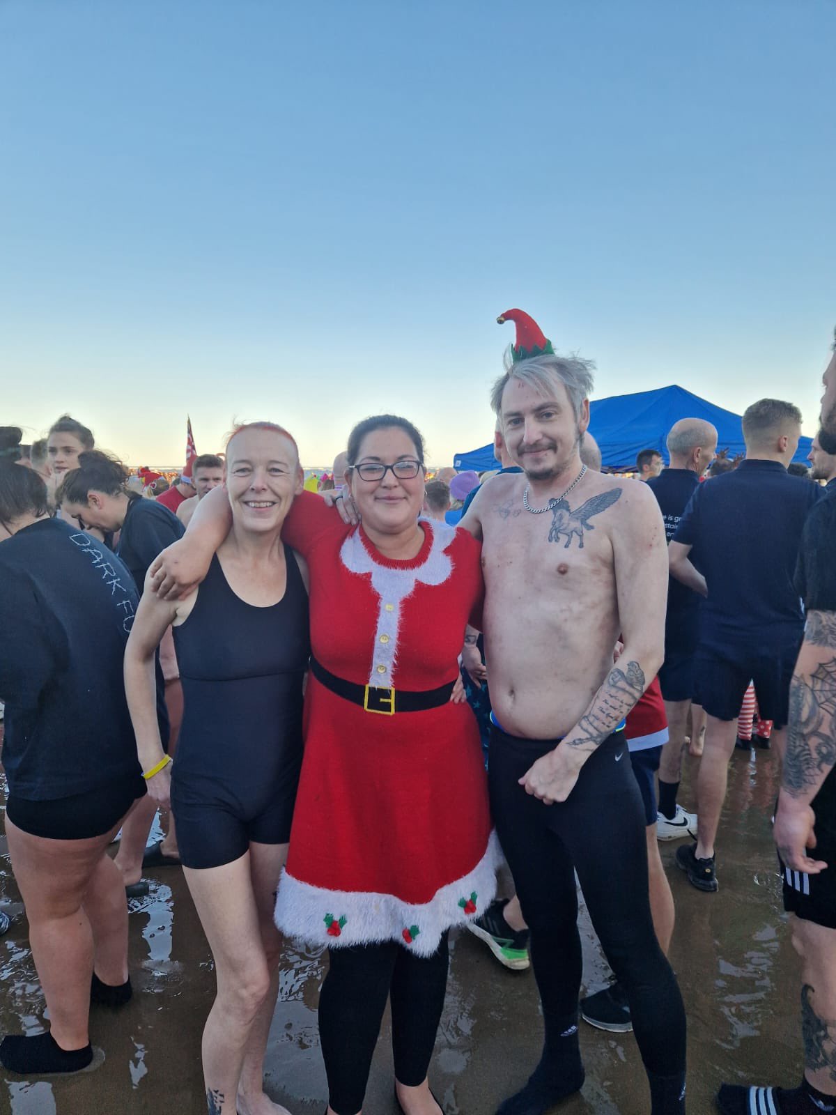 Mr Poole (right) took part in a Boxing Day dip in Redcar (Tom Poole/PA) 