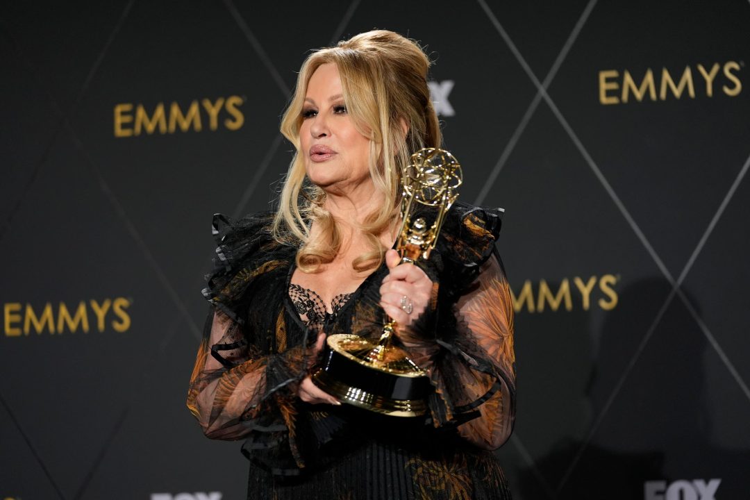 Jennifer Coolidge, winner of the award for outstanding supporting actress in a drama series for The White Lotus, poses in the press room during the 75th Primetime Emmy Awards on Monday