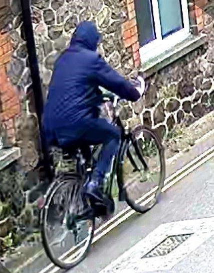 Avon and Somerset Police are trying to find out who the person cycling in the picture is.