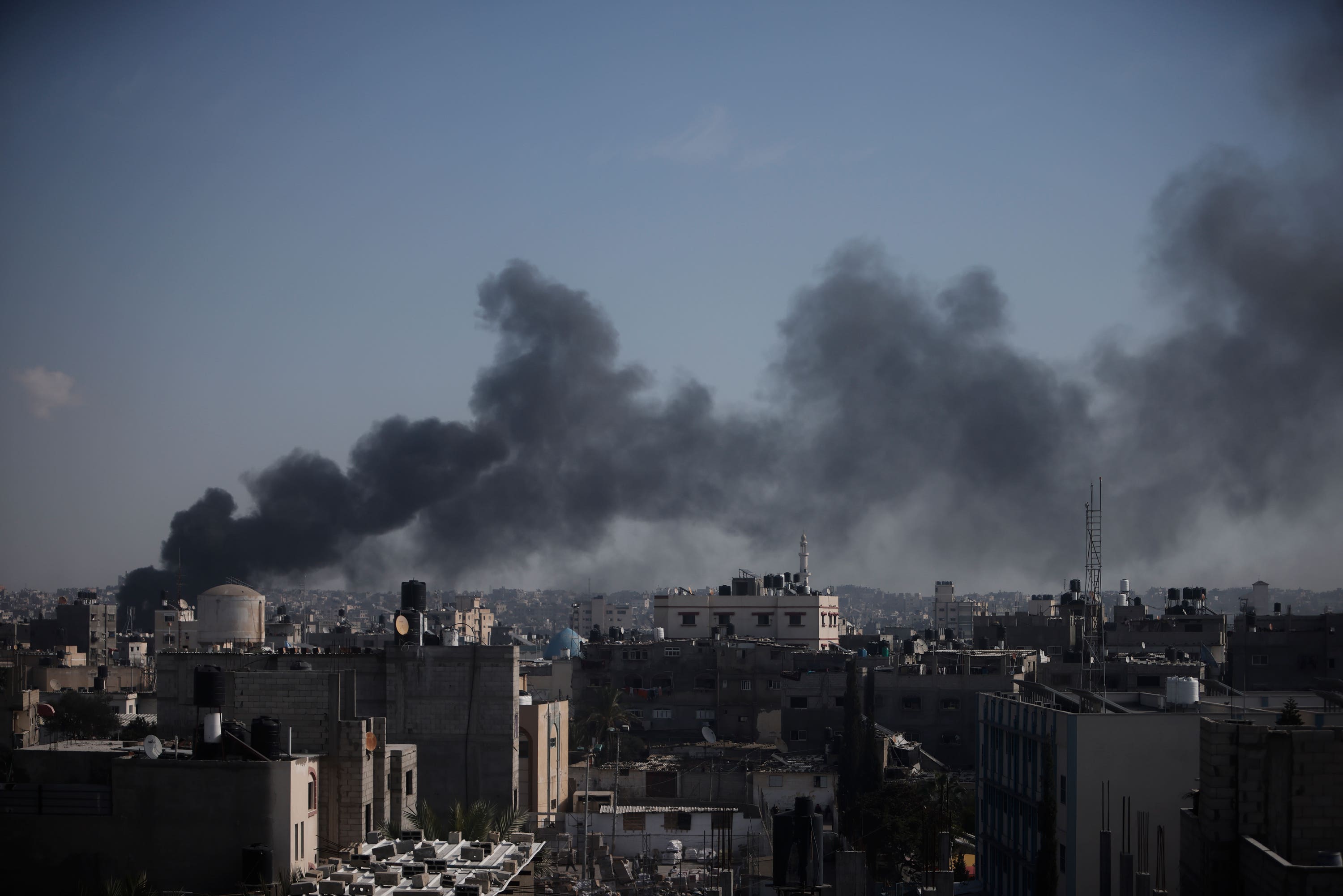 Smoke rises after an Israeli strike in Khan Younis.
