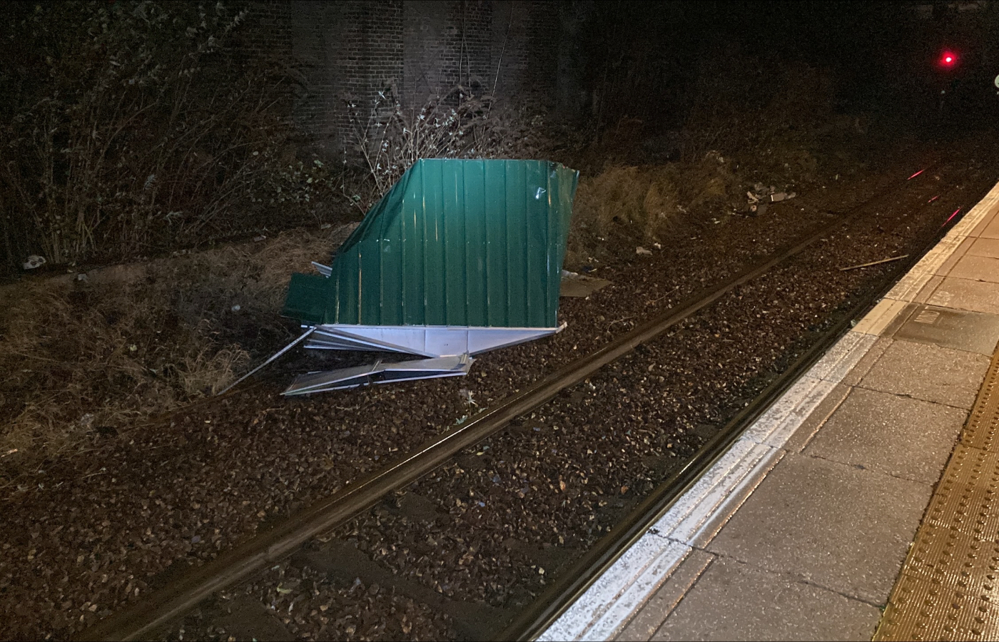 Part of a garden shed on the line at Bellgrove station in Glasgow caused by strong winds from Storm Isha.