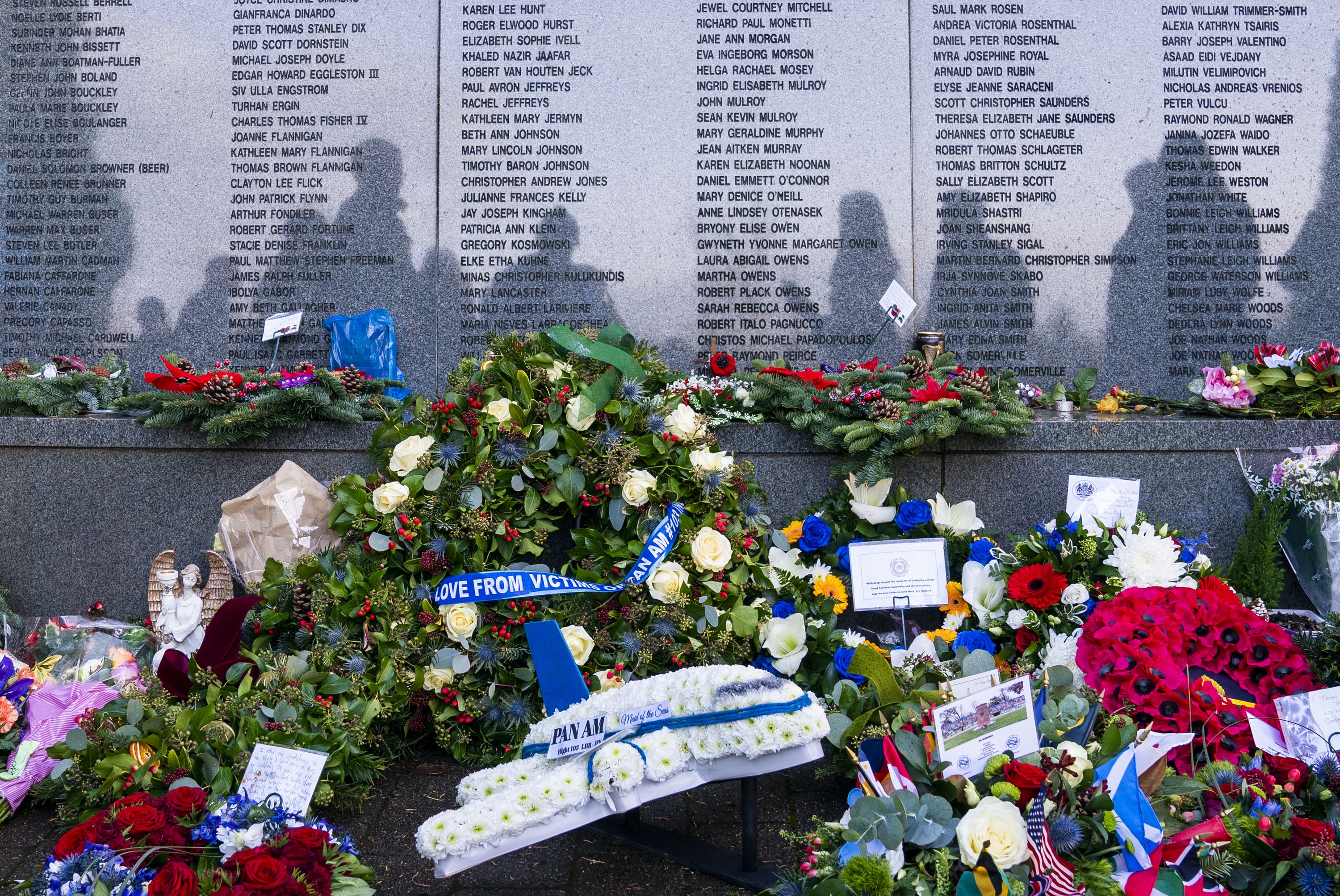 Wreaths and floral tributes laid during a ceremony to mark the 35th anniversary of the Lockerbie bombing (Jane Barlow/PA) 