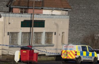 Police search for armed driver and passenger after two men shot outside Edinburgh pub on Hogmanay