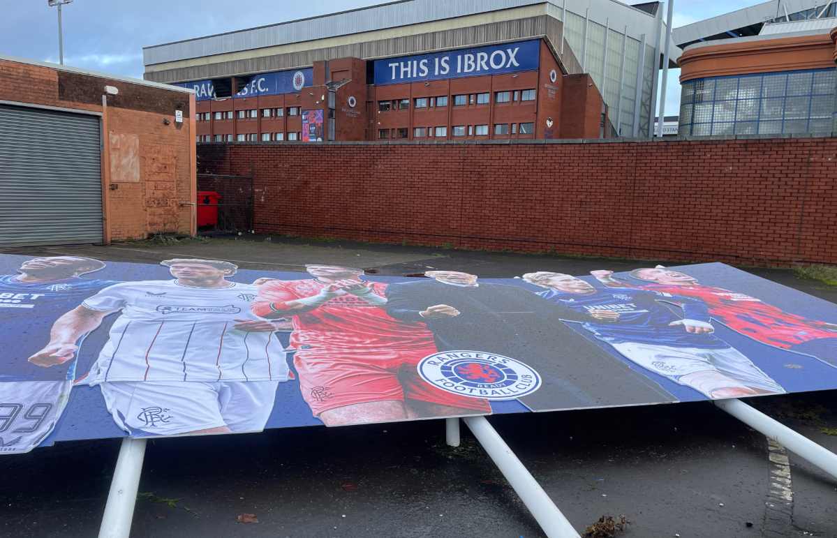 A sign depicting first team stars was blown over. 