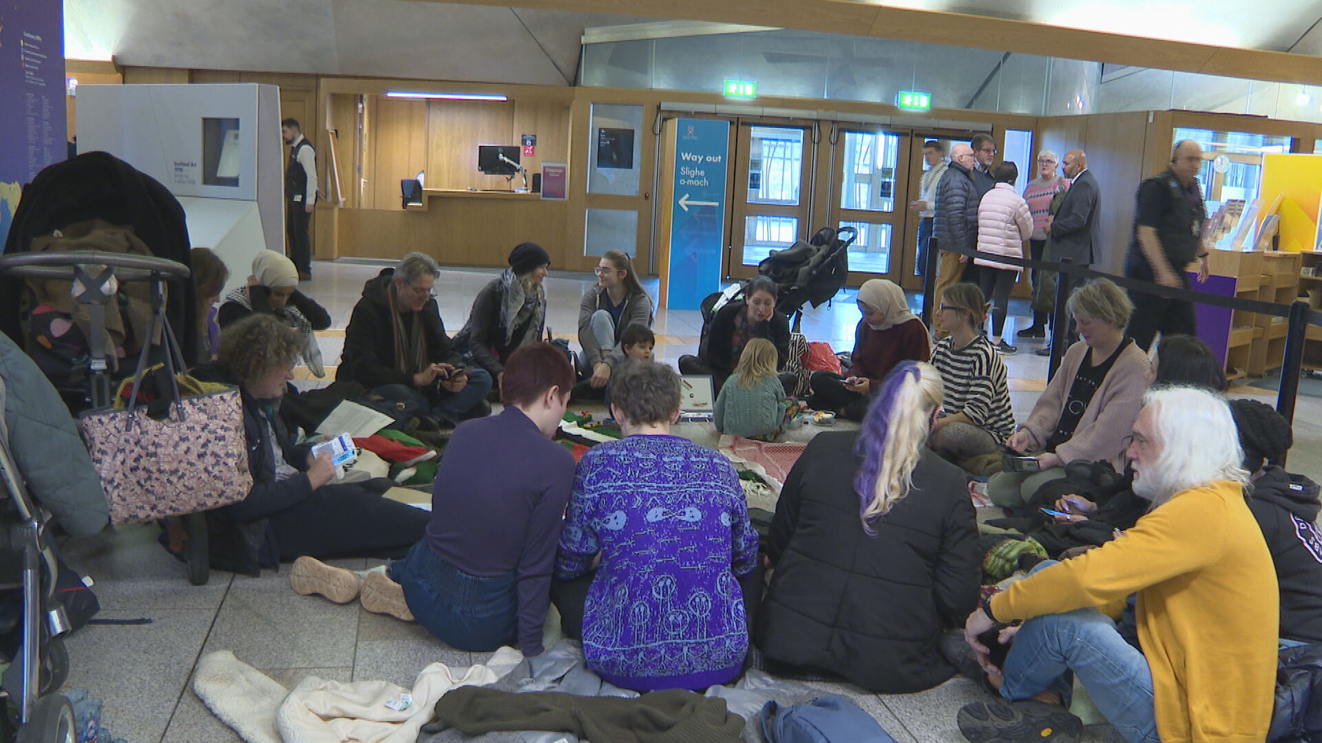 Pro-Palestinian protesters stage sit-in at Scottish Parliament.