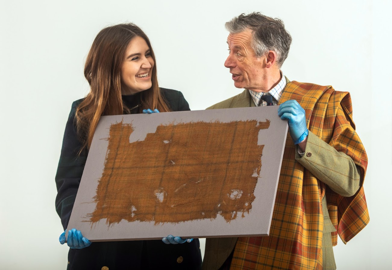 Emma Wilkinson, designer at House of Edgar with Peter E MacDonald, Head of Research & Collections at The Scottish Tartans Authority.