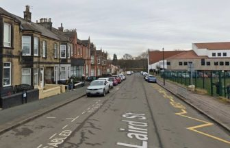 Woman dies at scene after blaze rips through property in Coatbridge