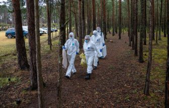 Forensics and police examine Lossiemouth woodland where missing woman was found dead