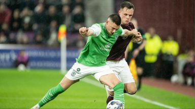 Lawrence Shankland scores from the spot as Hearts hit back to draw with Hibs