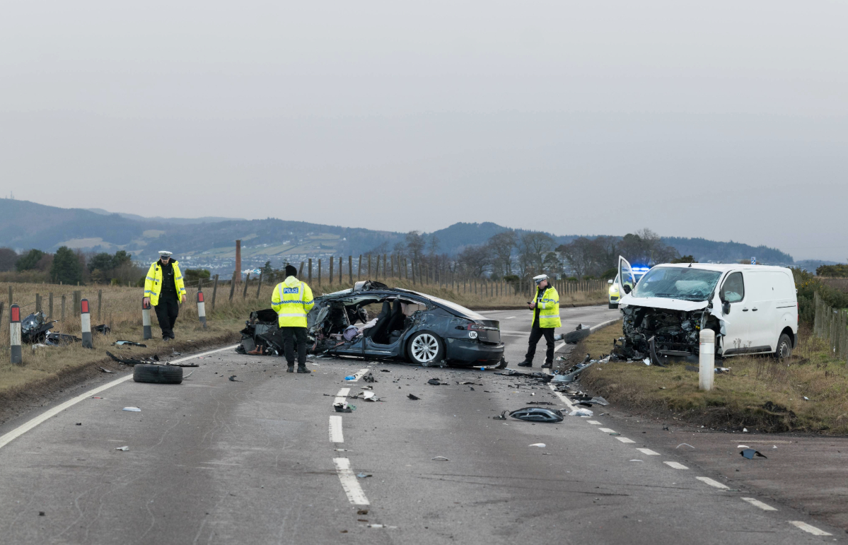 The crash involved a Tesla and a van. 