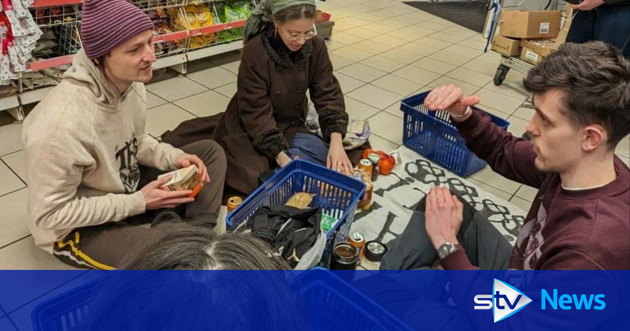 Four arrested after protestors stage picnic in supermarket