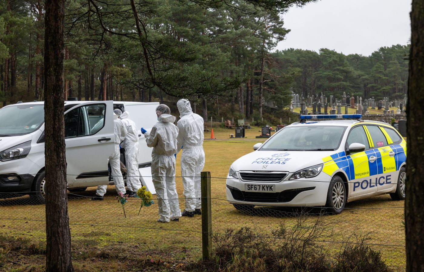 Police and forensics are investigating the 'unexplained death'.