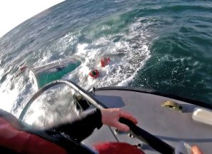 Fishermen rescued from sinking boat after capsizing in strong winds off west coast