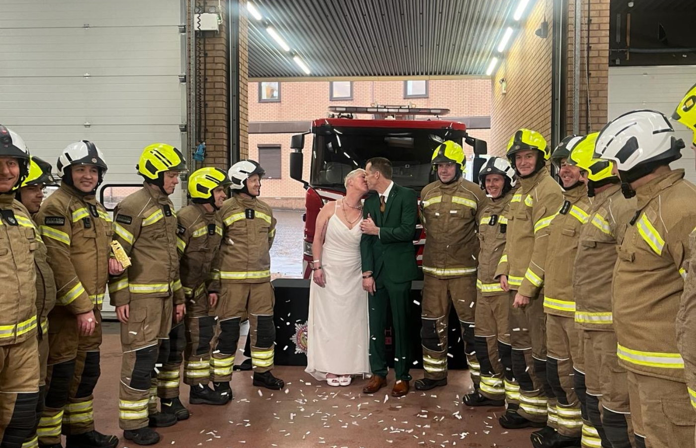 SFRS staff watched as the happy couple exchanged their vows at Calton Community Fire Station in Glasgow.