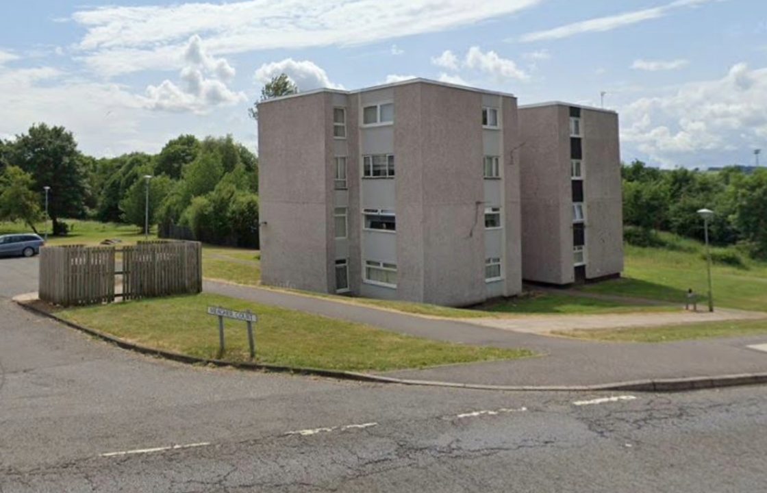 Woman taken to hospital after deliberate fire started outside flat in Cumnock