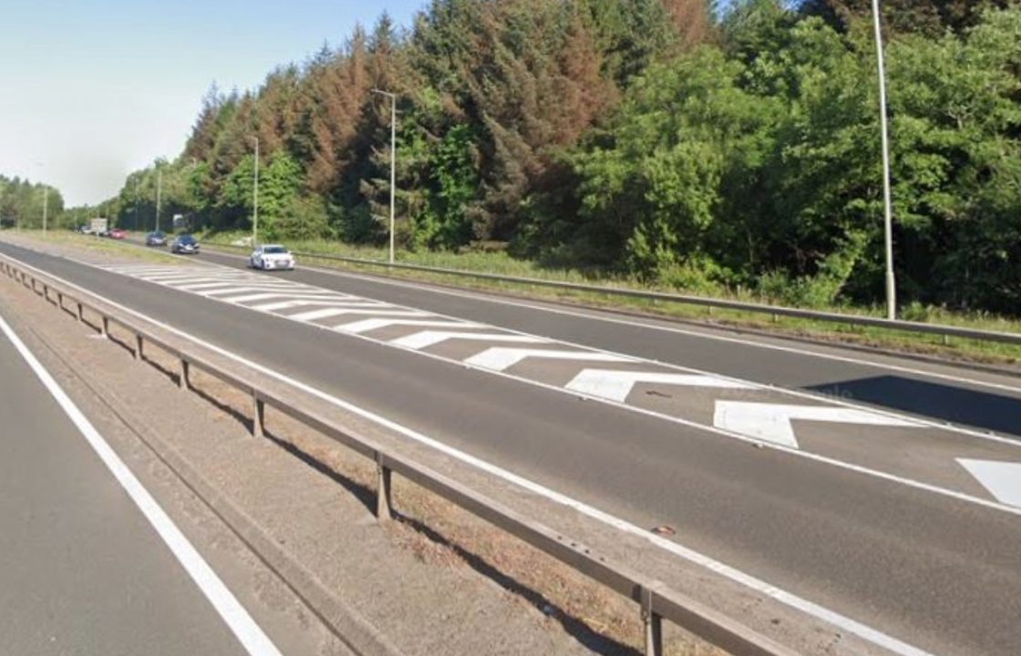 Man fighting for life after Bentley crashes into concrete barrier on East Kilbride Expressway