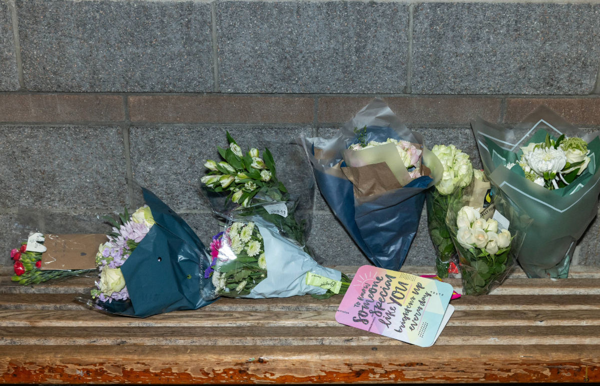 Floral tributes at Elgin bus station.