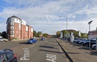 Police close off Glasgow road after two-vehicle crash