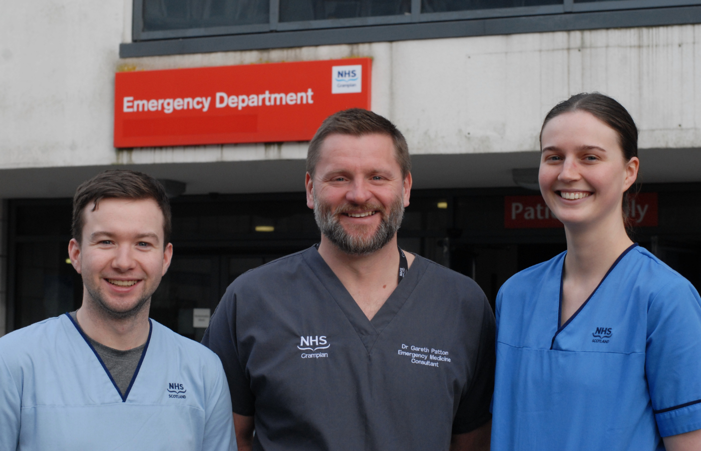 Gareth Patton, consultant in emergency medicine, Charlotte Pinkerton, staff nurse, and Alexander Brooks, senior health care support.