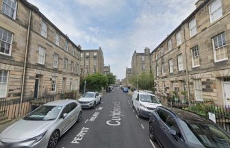 Elderly man reported after car crashed into Edinburgh tenement building