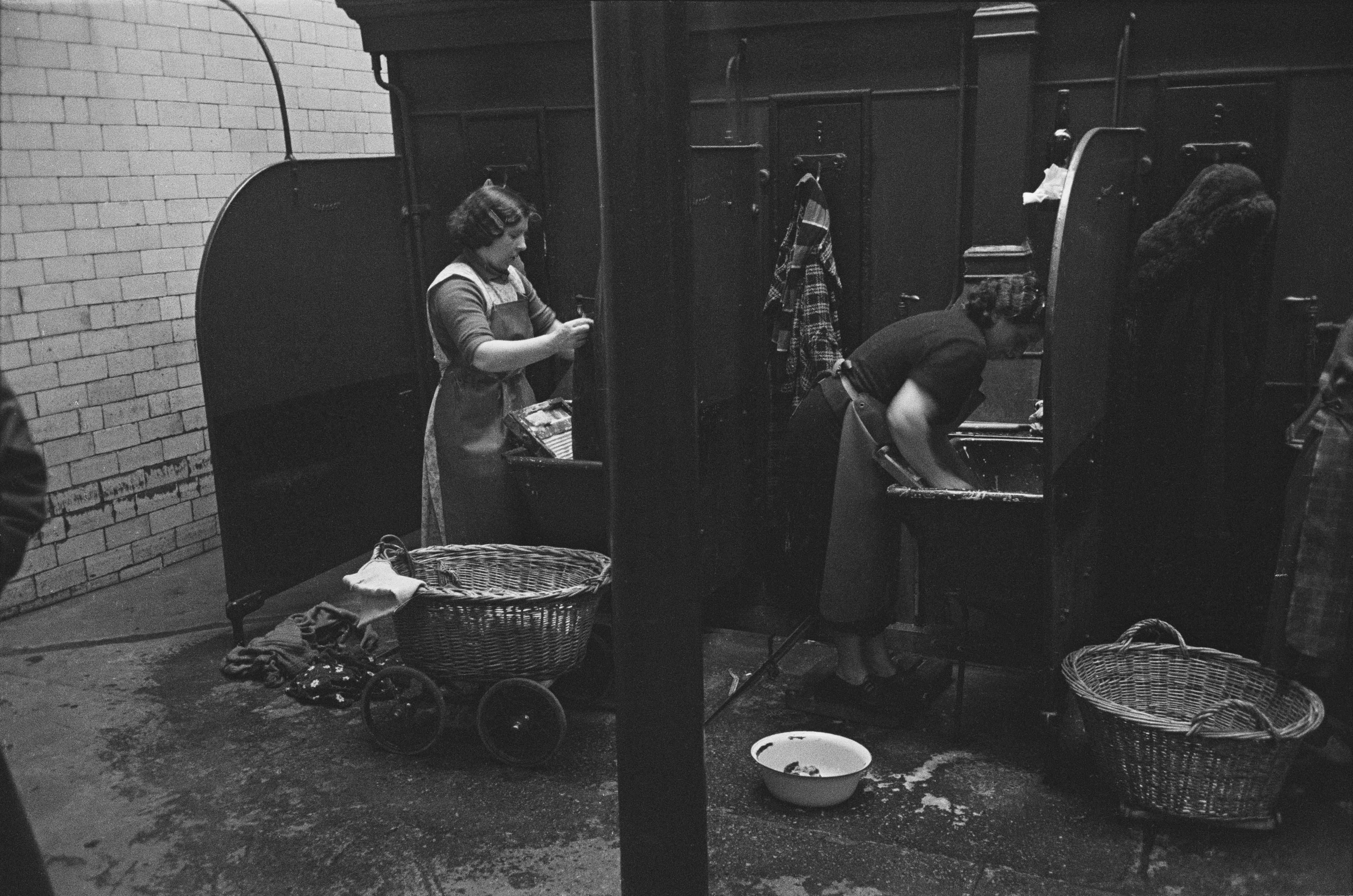 Glaswegian housewives doing their laundry at a steamie connected to the public baths. Glasgow, March 1939. Original publication: Picture Post - 91 - Glasgow - pub. April  1 1939 (Photo by Humphrey Spender/Picture Post/Hulton Archive/Getty Images)