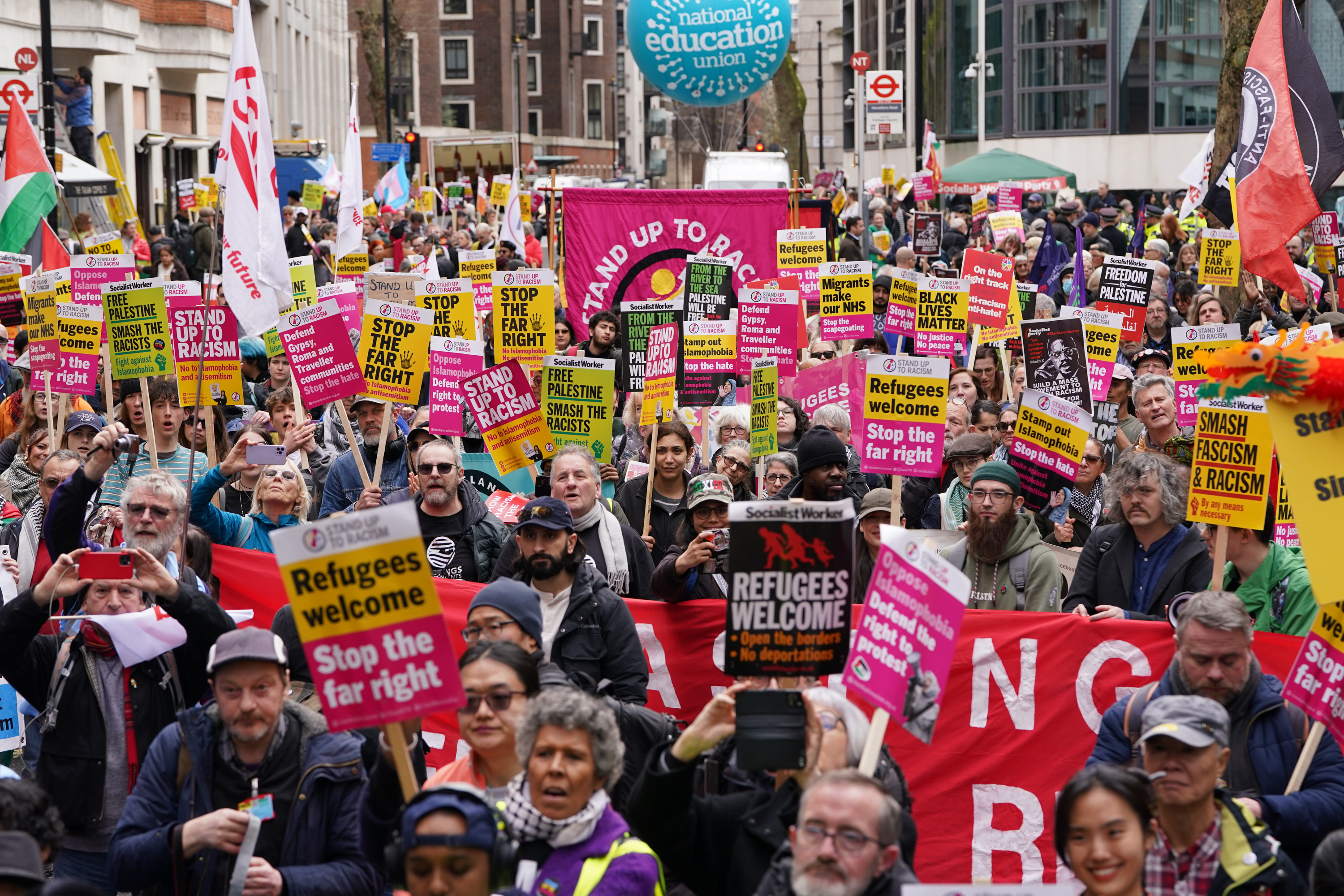 People take part in an anti-racism march in central London organised by Stand Up To Racism and trade unions (Lucy North/PA).