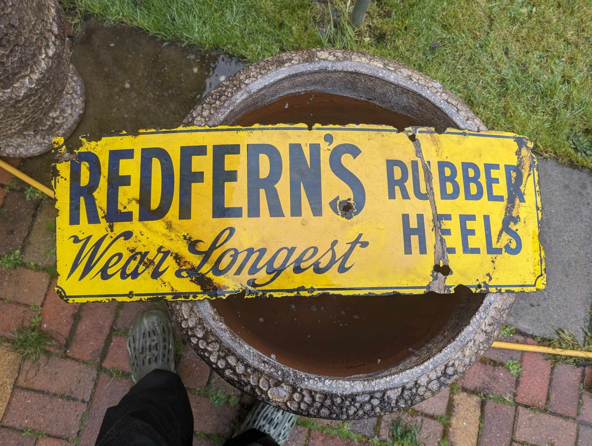 Restored sign pulled from a Glasgow canal. 
