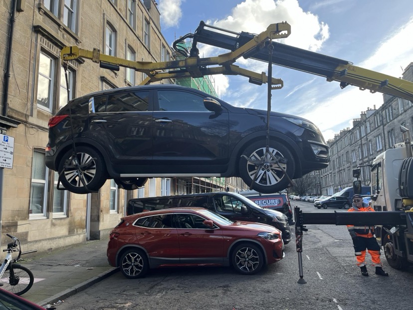 A car being lifted for impoundment in Edinburgh