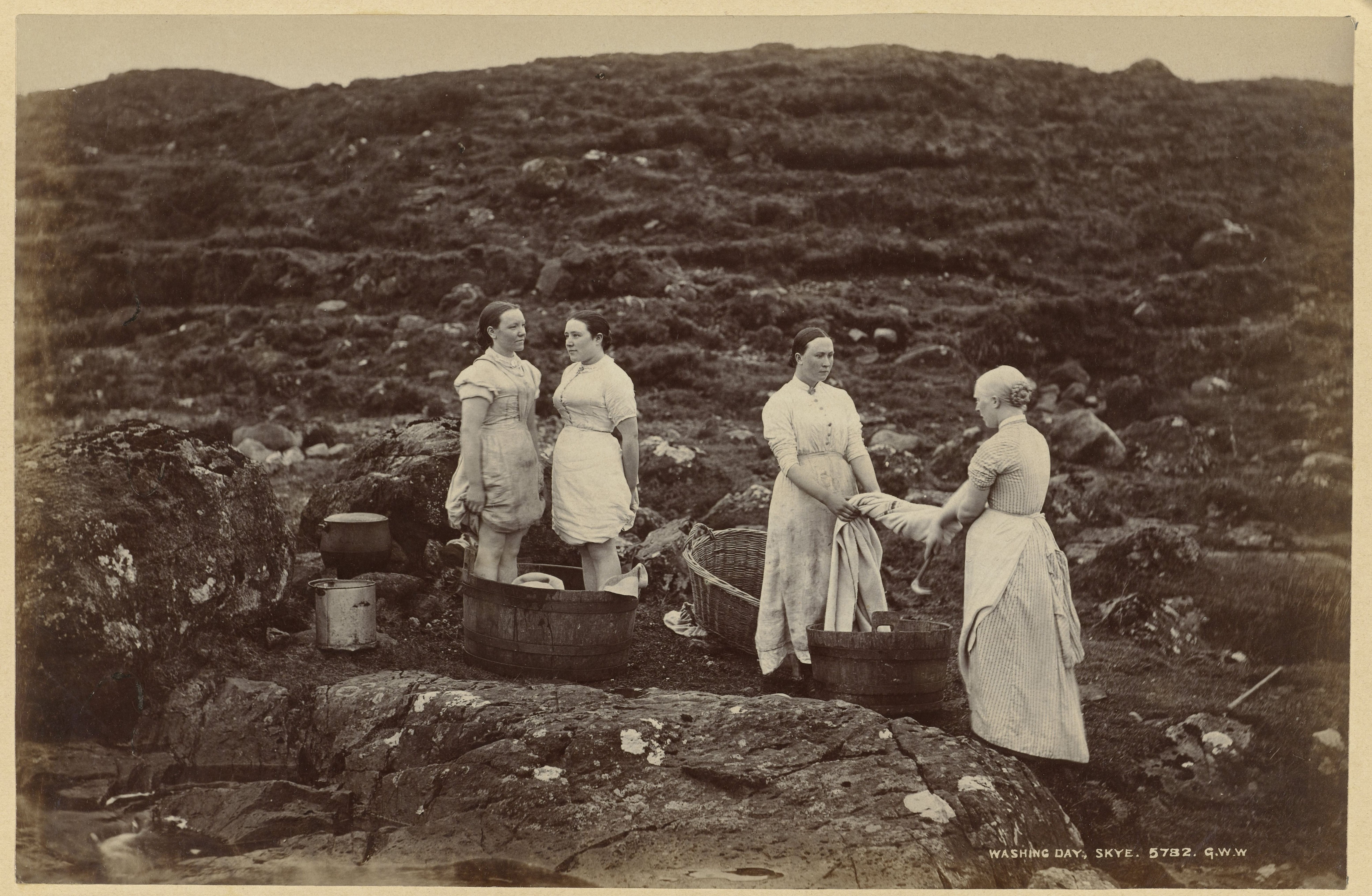 Four women with tubs and laundry on Skye, 1860-1880. George Washington Wilson. Photo by: Sepia Times/Universal Images Group via Getty Images