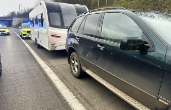 Boy, 11, arrested after driving BMW towing suspected stolen caravan on motorway