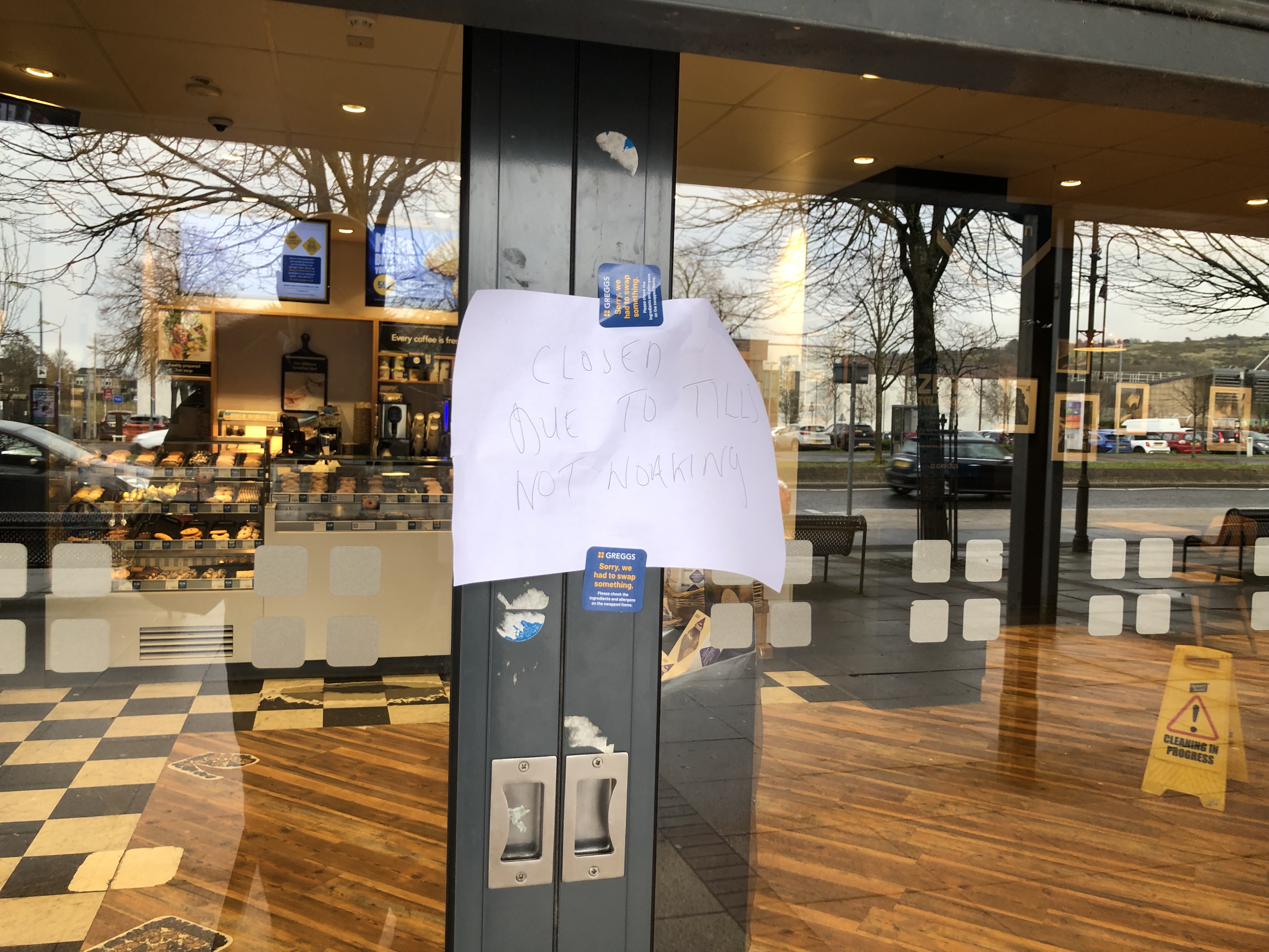A store in Barrhead was closed with a notice to customers on the door. Photo: STV News.