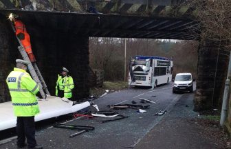 Double-decker bus roof ripped off after crashing into low bridge in West Lothian