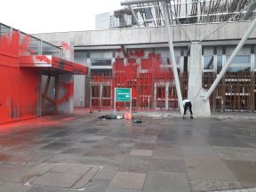 Three arrested after red paint sprayed on Scottish Parliament