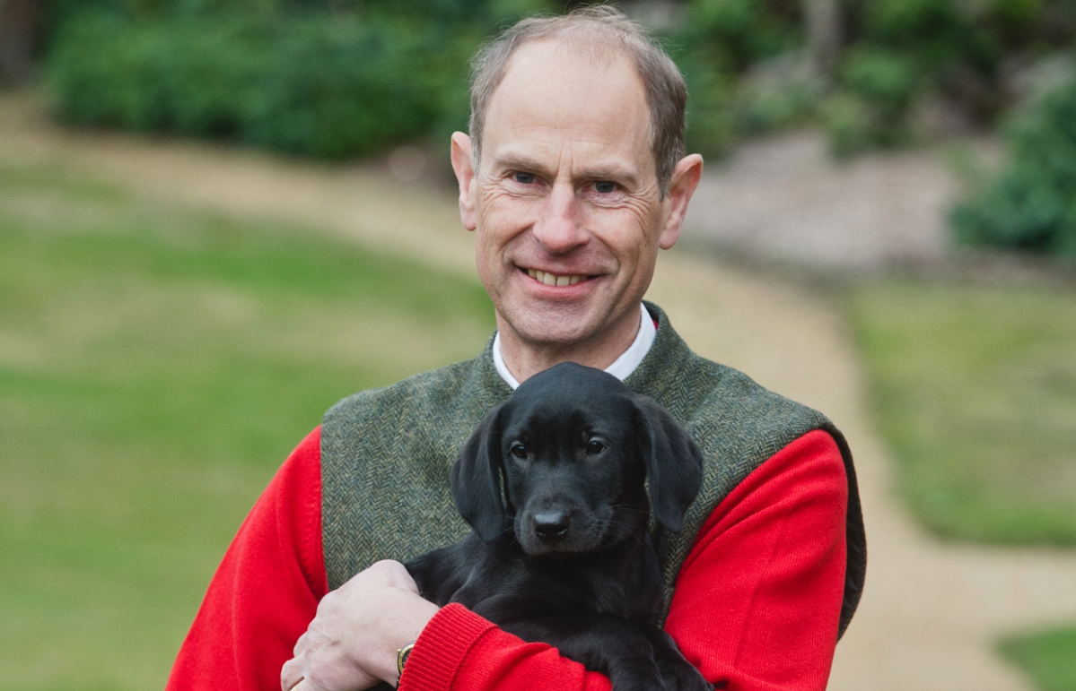The Duke of Edinburgh with his Labrador puppy Teasel (Chris Jelf/Buckingham Palace/PA) 