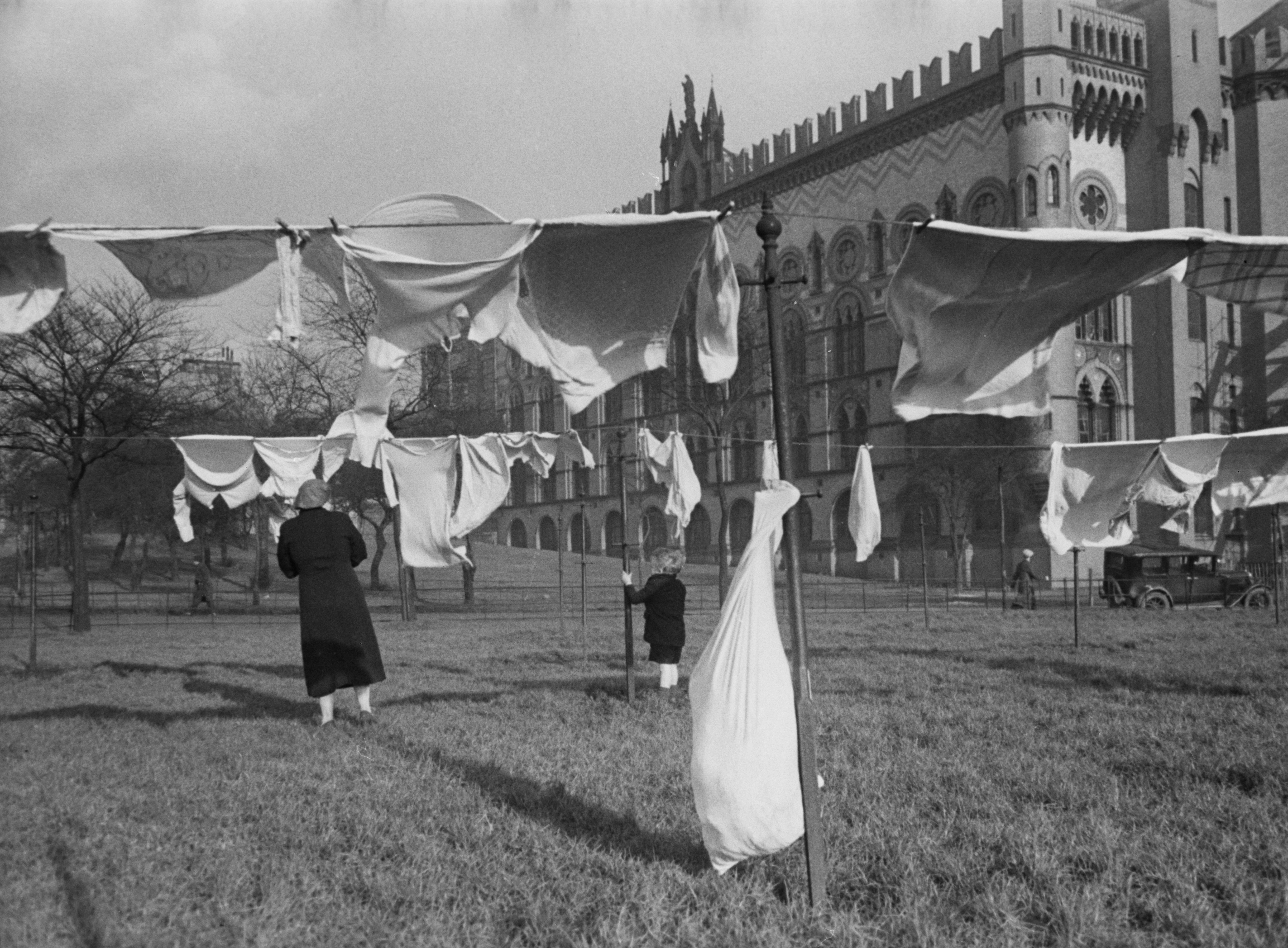 Public clothes lines on Glasgow Green, near the municipal washhouse in Glasgow, Scotland, 1939. Original Publication : Picture Post - 91- Glasgow - pub. 1st April 1939 (Photo by Humphrey Spender/Picture Post/Hulton Archive/Getty Images)