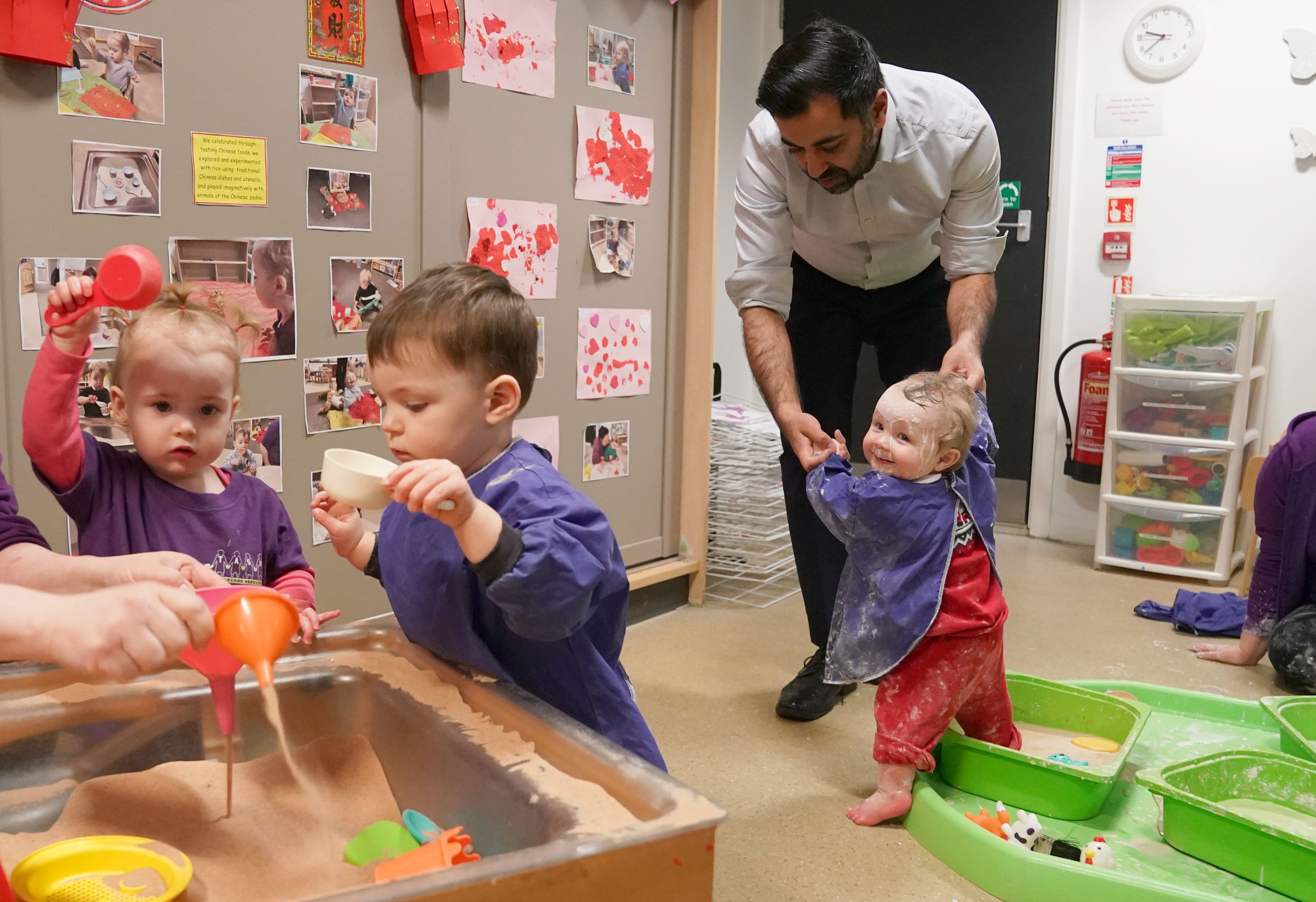 Humza Yousaf played with the children during a visit to Task Childcare in Glasgow. 