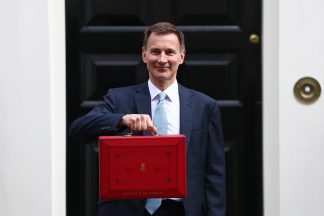LONDON, ENGLAND - MARCH 6: The Chancellor Of The Exchequer Jeremy Hunt leaves 11 Downing Street on March 6, 2024 in London, England. Chancellor Jeremy Hunt delivers his 2024 Spring Budget to Parliament. (Photo by Peter Nicholls/Getty Images)